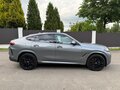 2025 BMW X6 30d III (G06) Рестайлинг, серый - вид 3