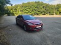 2008 Ford Focus II Рестайлинг, красный, 650000 рублей - вид 1