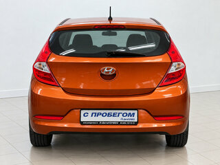 2015 Hyundai Solaris I Рестайлинг, оранжевый, 695000 рублей, вид 3
