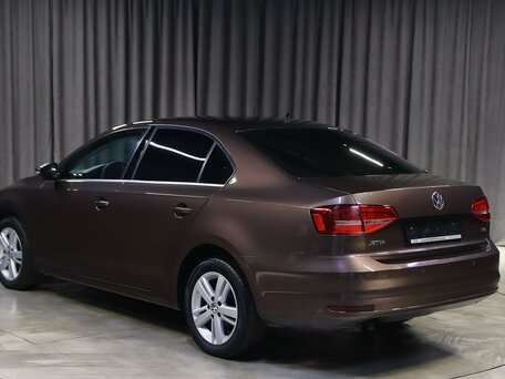 2015 Volkswagen Jetta VI Рестайлинг, коричневый, 949000 рублей, вид 4