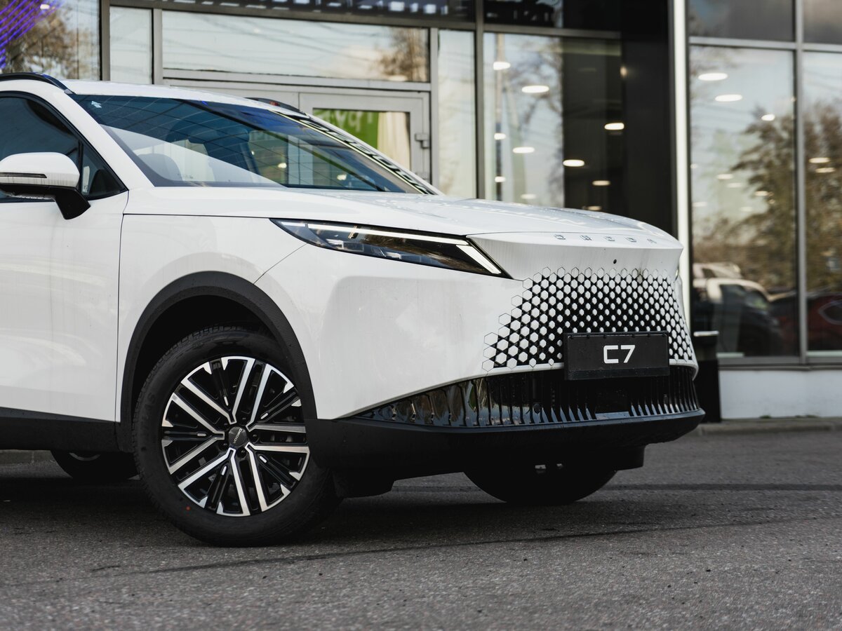 Открыть фотографии: Omoda C7