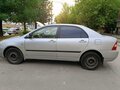 2003 Toyota Corolla IX (E120, E130), серебристый - вид 3