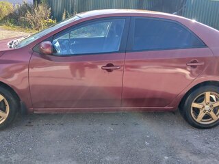 2011 Kia Cerato 6-speed II, красный, 560000 рублей, вид 2