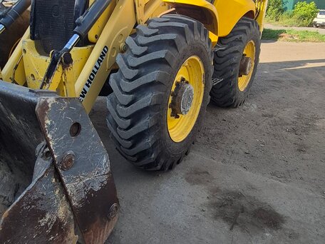 2012 New Holland B115B, жёлтый, 5000000 рублей, вид 1