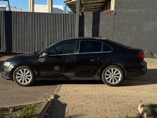 2016 Volkswagen Jetta VI Рестайлинг, чёрный, 900000 рублей, вид 5