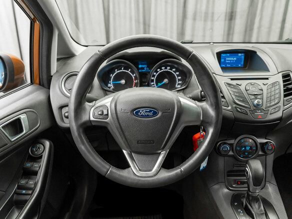2015 Ford Fiesta Mk6 Рестайлинг, оранжевый - вид 12