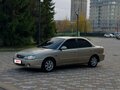 2007 Kia Spectra I Рестайлинг 2, бежевый - вид 1