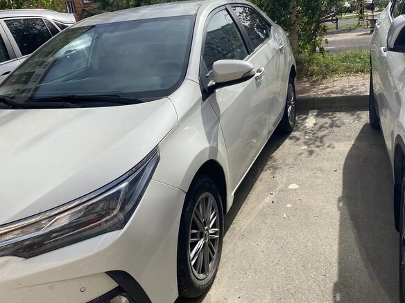 2018 Toyota Corolla XI (E160, E170, E180) Рестайлинг 1, белый, 1850000 рублей - вид 1
