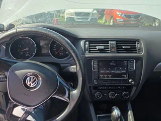 2016 Volkswagen Jetta VI Рестайлинг, белый, 913000 рублей, вид 3