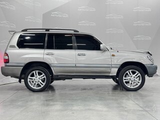 2004 Toyota Land Cruiser 105 100 Series Рестайлинг 1, серый, 1680000 рублей, вид 4