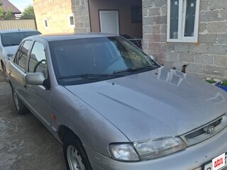 1998 Kia Sephia I Рестайлинг, серебристый, 125000 рублей, вид 2