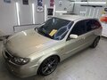 2003 Mazda 323 VI (BJ) Рестайлинг, бежевый, 430000 рублей - вид 5