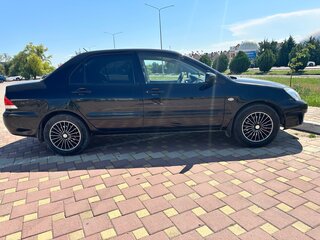 2007 Mitsubishi Lancer IX Рестайлинг, чёрный, 360000 рублей, вид 4
