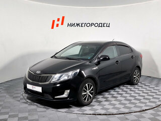 2011 Kia Rio 5-speed III, чёрный, 601000 рублей, вид 1