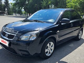 2011 Kia Rio II Рестайлинг, чёрный, 550000 рублей, вид 1