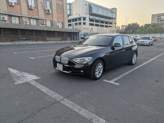 2012 BMW 1 серии 116i II (F20/F21), чёрный, 1400000 рублей, вид 1