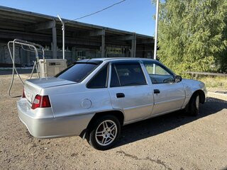 2012 Daewoo Nexia I Рестайлинг, серебристый, 210000 рублей, вид 4