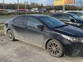 2013 Toyota Corolla XI (E160, E170, E180), чёрный, 960000 рублей - вид 5