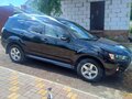 2010 Mitsubishi Outlander II Рестайлинг, чёрный, 1050000 рублей - вид 2