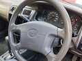 1999 Toyota Corolla VII (E100), синий - вид 11