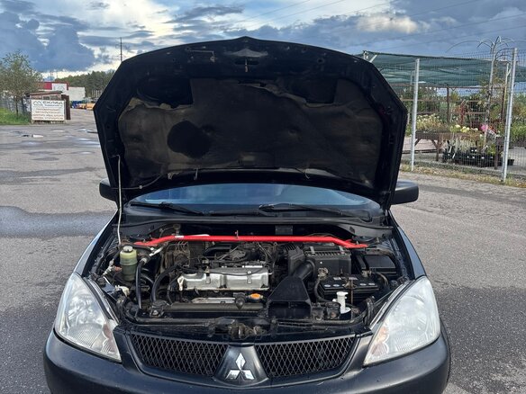 2009 Mitsubishi Lancer Classic IX Рестайлинг, чёрный, 330000 рублей - вид 2