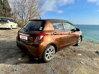 2011 Toyota Vitz III (XP130), коричневый, 790000 рублей, вид 5