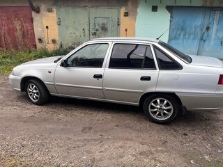 2012 Daewoo Nexia I Рестайлинг, серебристый, 199000 рублей, вид 2