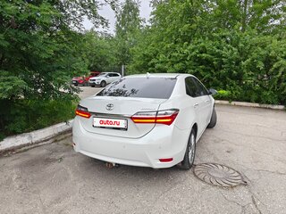 2018 Toyota Corolla XI (E160, E170, E180) Рестайлинг 1, белый, 2050000 рублей, вид 4