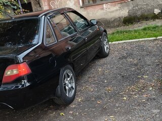 2011 Daewoo Nexia I Рестайлинг, чёрный, 185000 рублей, вид 2