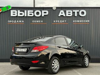 2011 Hyundai Solaris I, чёрный, 789000 рублей, вид 2