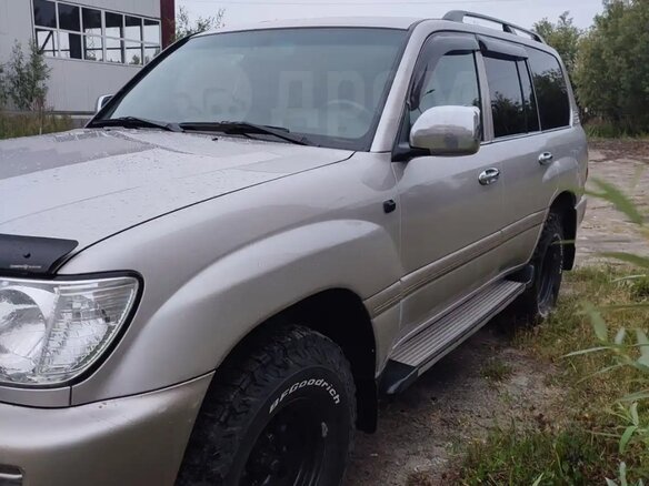 2004 Toyota Land Cruiser 105 100 Series Рестайлинг 1, серебристый - вид 11