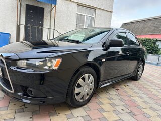 2012 Mitsubishi Lancer X Рестайлинг, чёрный, 650000 рублей, вид 1