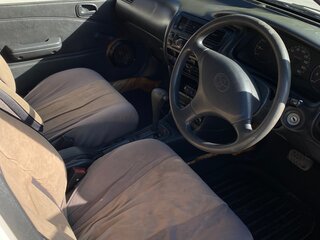 1998 Toyota Corolla VII (E100), белый, 256000 рублей, вид 4