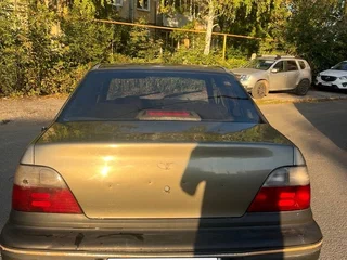 2001 Daewoo Nexia I, коричневый, 65000 рублей, вид 3