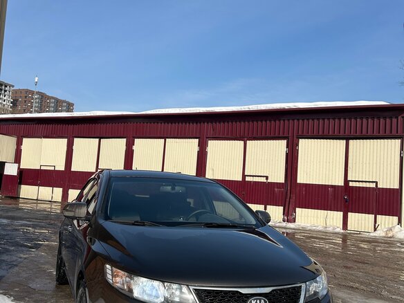 2011 Kia Cerato 6-speed II, золотистый - вид 1