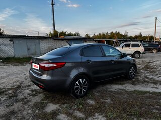 2014 Kia Rio 5-speed III, серый, 800000 рублей, вид 5