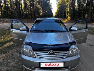 2005 Toyota Corolla IX (E120, E130) Рестайлинг, серебристый, 655000 рублей, вид 2