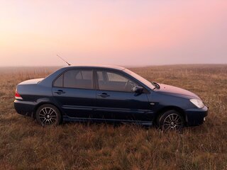2006 Mitsubishi Lancer IX Рестайлинг, синий, 290000 рублей, вид 3