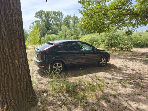 2009 Ford Focus II Рестайлинг, чёрный - вид 2