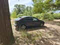 2009 Ford Focus II Рестайлинг, чёрный - вид 2