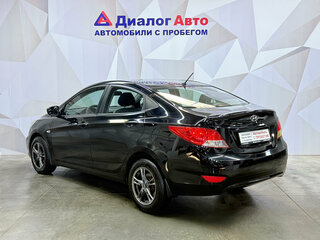 2011 Hyundai Solaris I, чёрный, 670000 рублей, вид 4
