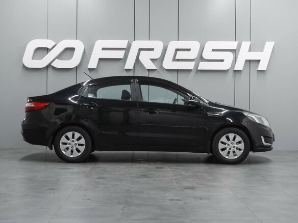 2011 Kia Rio 5-speed III, чёрный, 874000 рублей - вид 4