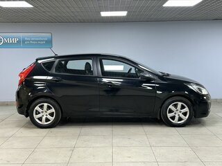 2012 Hyundai Solaris I, чёрный, 771000 рублей, вид 4