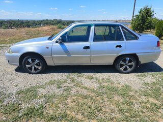 2012 Daewoo Nexia I Рестайлинг, серебристый, 220000 рублей, вид 5