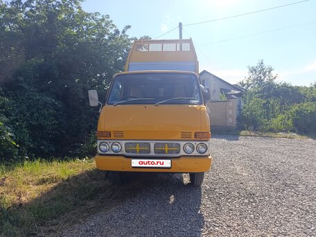 1991 Nissan Atlas, жёлтый, 1350000 рублей, вид 1