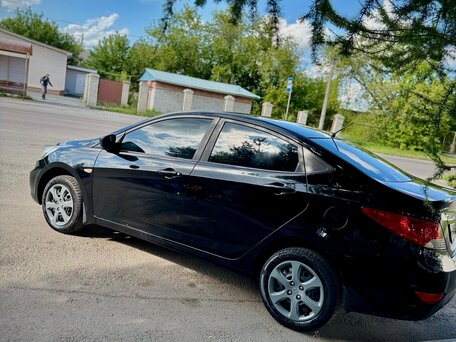 2011 Hyundai Solaris I, чёрный, 630000 рублей, вид 5