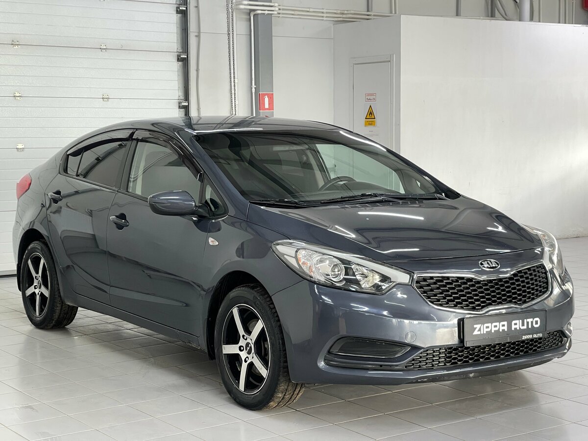 Открыть фотографии: Kia Cerato III