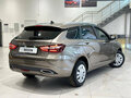 2026 Lada (ВАЗ) Vesta SW I Рестайлинг (NG), серый - вид 2