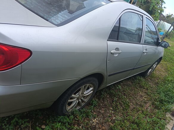 2003 Toyota Corolla IX (E120, E130), серебристый, 500000 рублей - вид 2