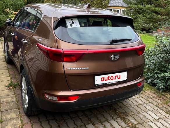 2017 Kia Sportage IV, коричневый, 1750000 рублей - вид 4